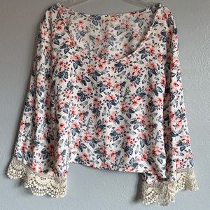 Hollister Floral Shirt with Lace on end of sleeve.